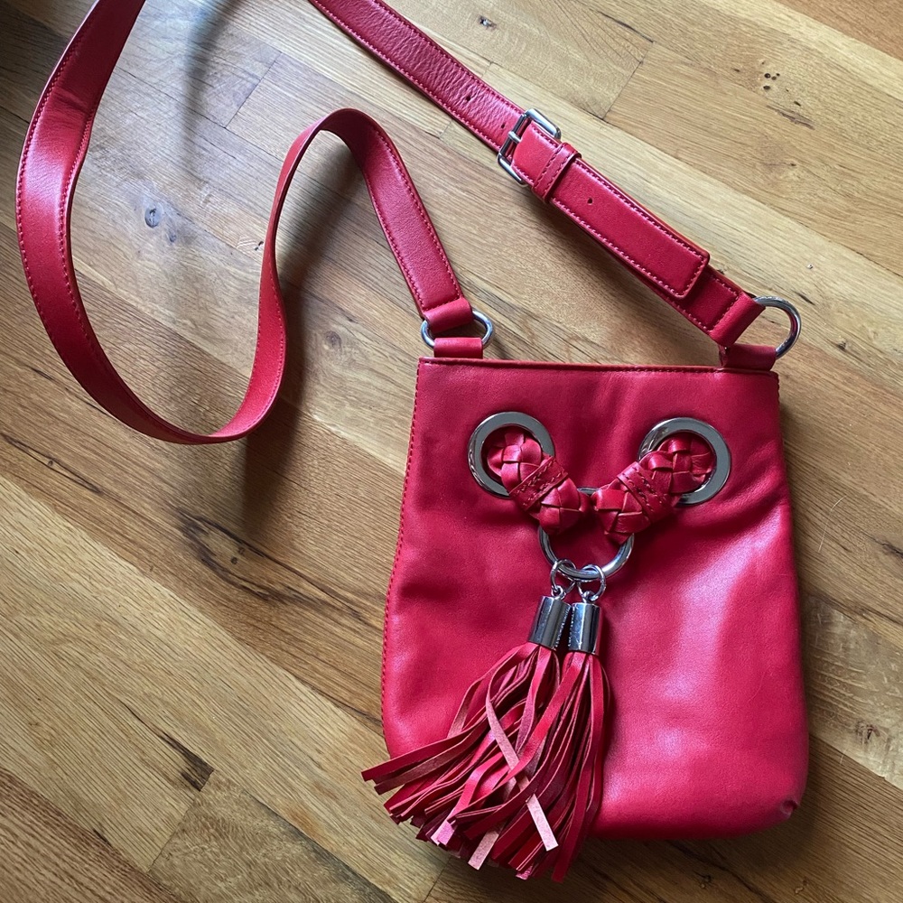 Michael Kors Red Leather Crossbody Bag with Fringe Tassels and Silver Grommets